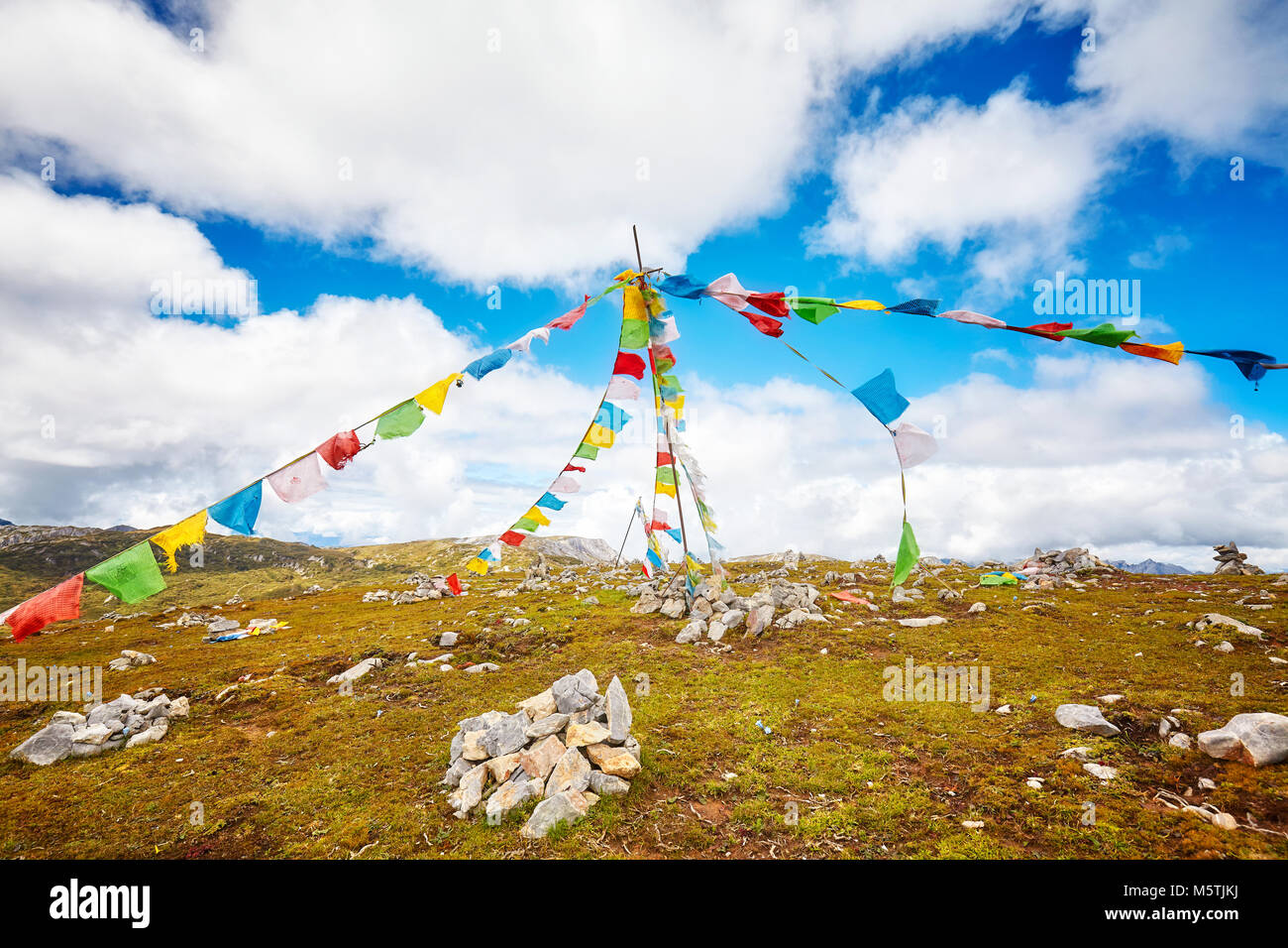 Buddhist prayer flags in the Shika Snow Mountain scenic area, Yunnan Province, China. Stock Photo