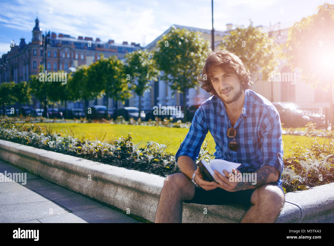 Portrait of young handsome stylish man on the street Stock Photo - Alamy