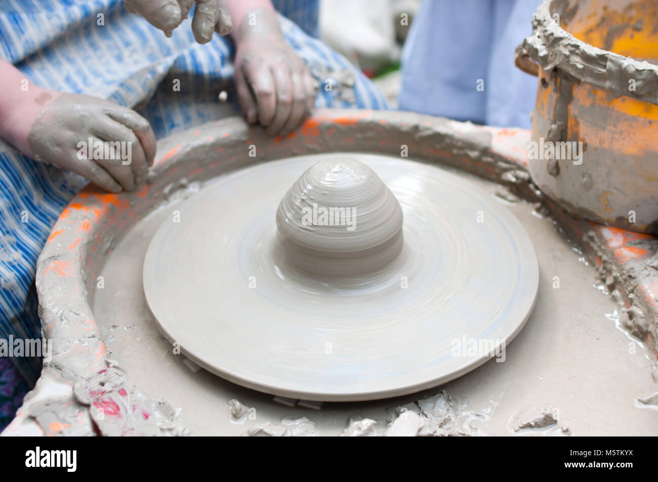 Pottery formation process of the clay dish with traditional method as