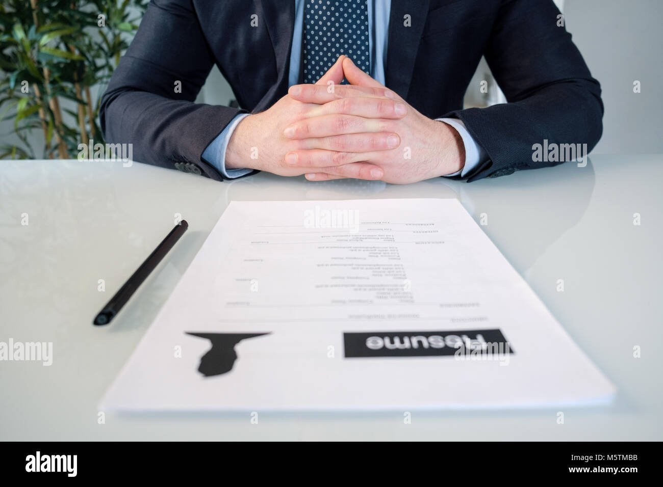 Executive hands ready to sign a job contract Stock Photo