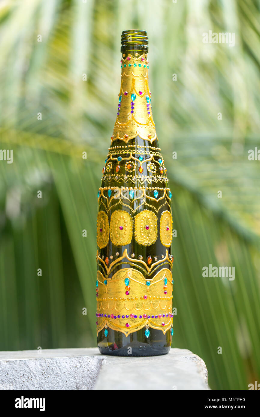 Decorative glass bottle decorated with rhinestones Stock Photo Alamy