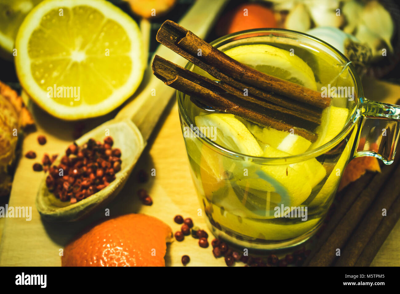 Natural treatment for colds and flu. Ginger lemon garlic tea against influenza. Hot tea for