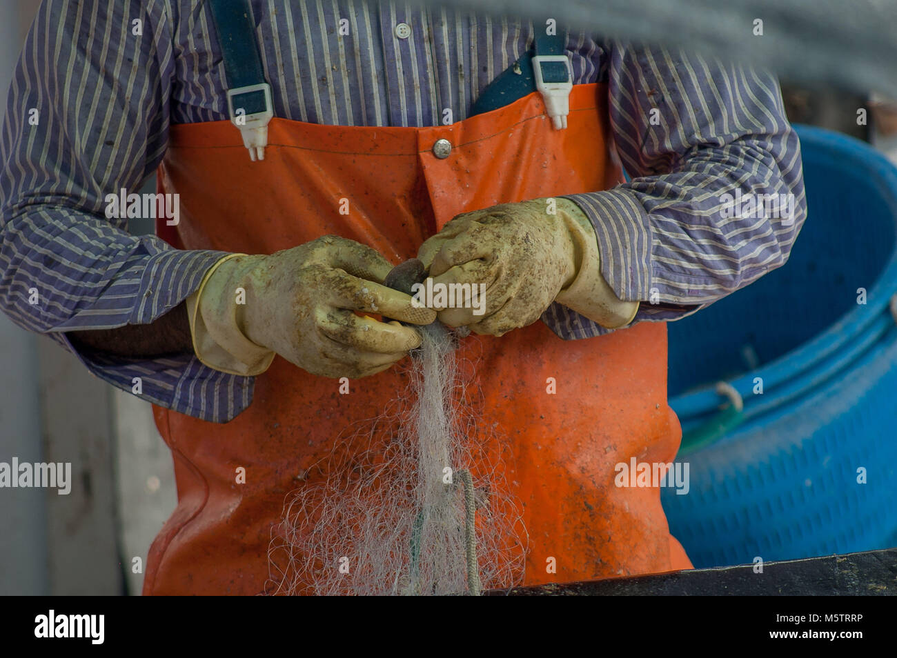 cleaning of fishing nets Stock Photo Alamy