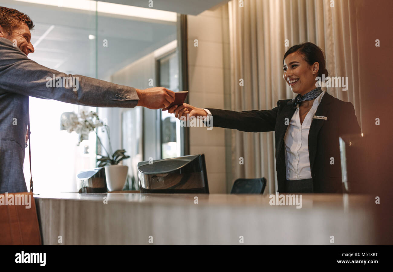 Passport hotel check in hi-res stock photography and images - Alamy