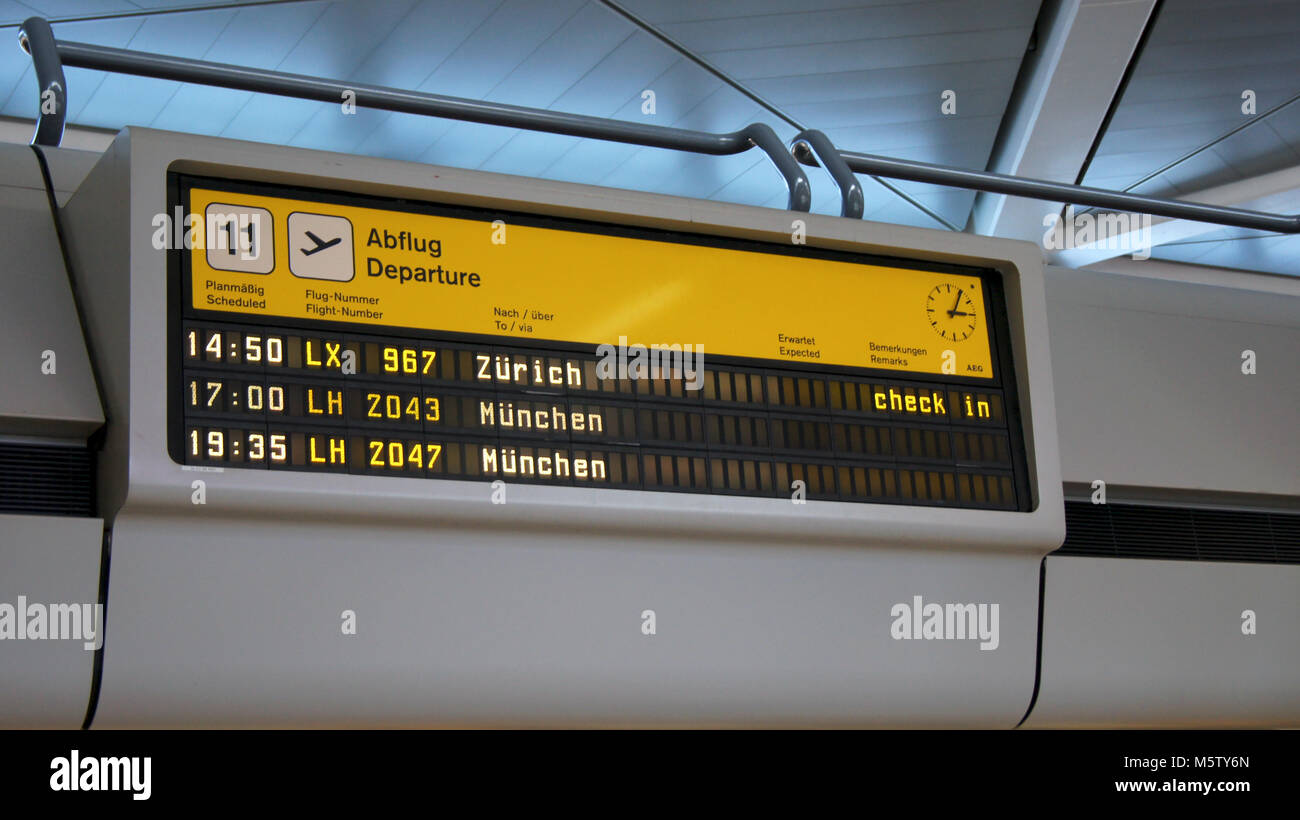 BERLIN, GERMANY - MAR 31st, 2015: A split-flap display at the Berlin Tegel Airport, TXL departure board Stock Photo