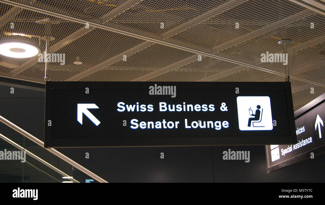 ZURICH, SWITZERLAND - MAR 31st, 2015: airport sign to SWISS Business and Senator Lounge inside the terminal building Stock Photo
