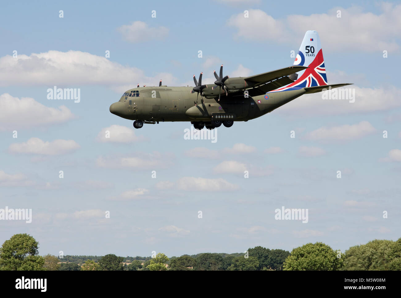 Lockheed Hercules C.5, ZH883 of 30 & 47 Squadrons, RAF, wearing Special marks, 50 years Hercules operations, seen and based at RAF Brize Norton, Oxon Stock Photo