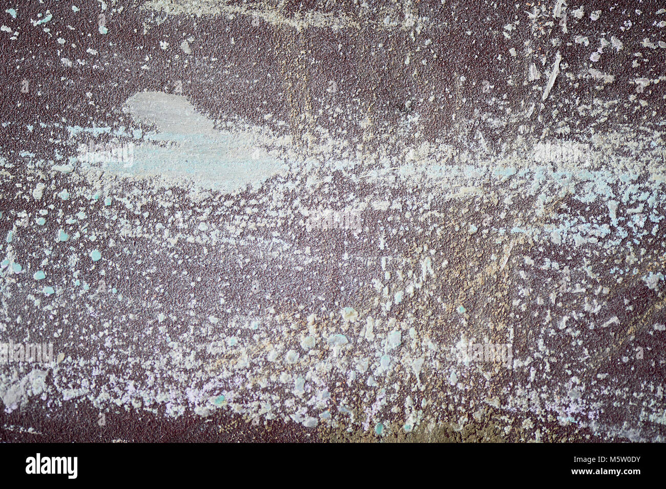 Sandpaper with scratches and paint residue.Texture or background