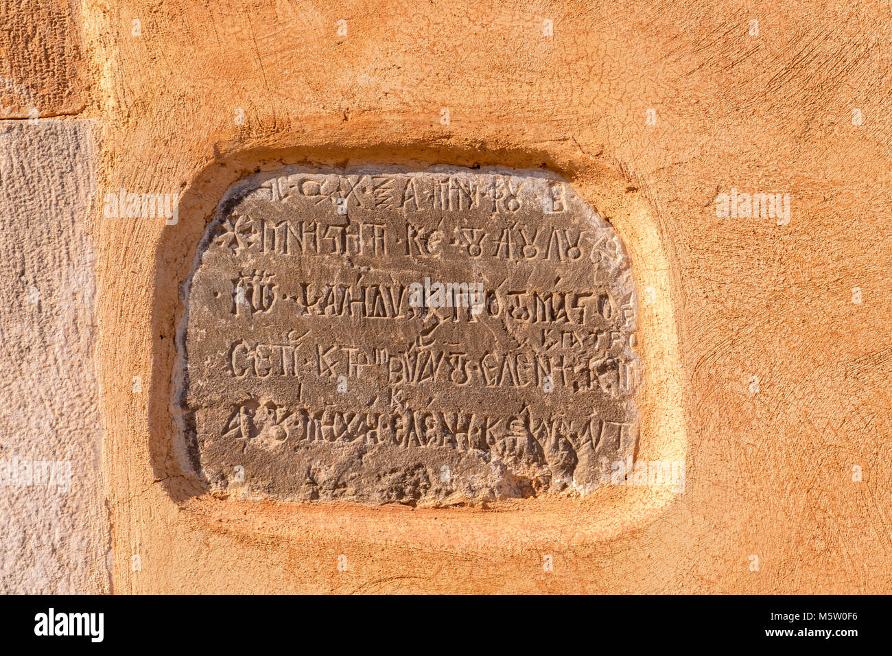 Tablet with greek carving on Spinalonga, Crete Stock Photo