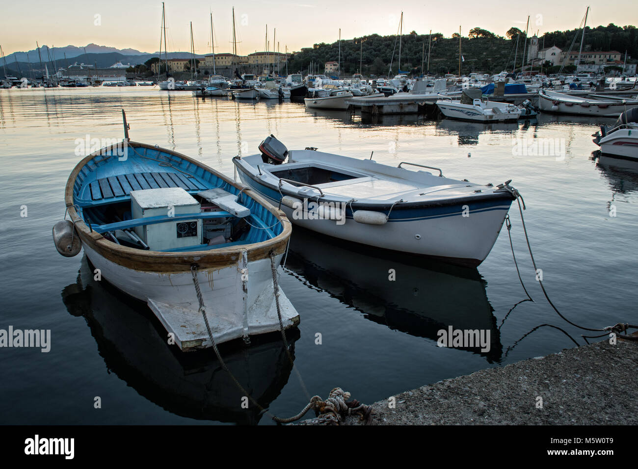 Boats in the port of Le Grazie at dawn, Porto Venere, Liguria, Italy Stock Photo