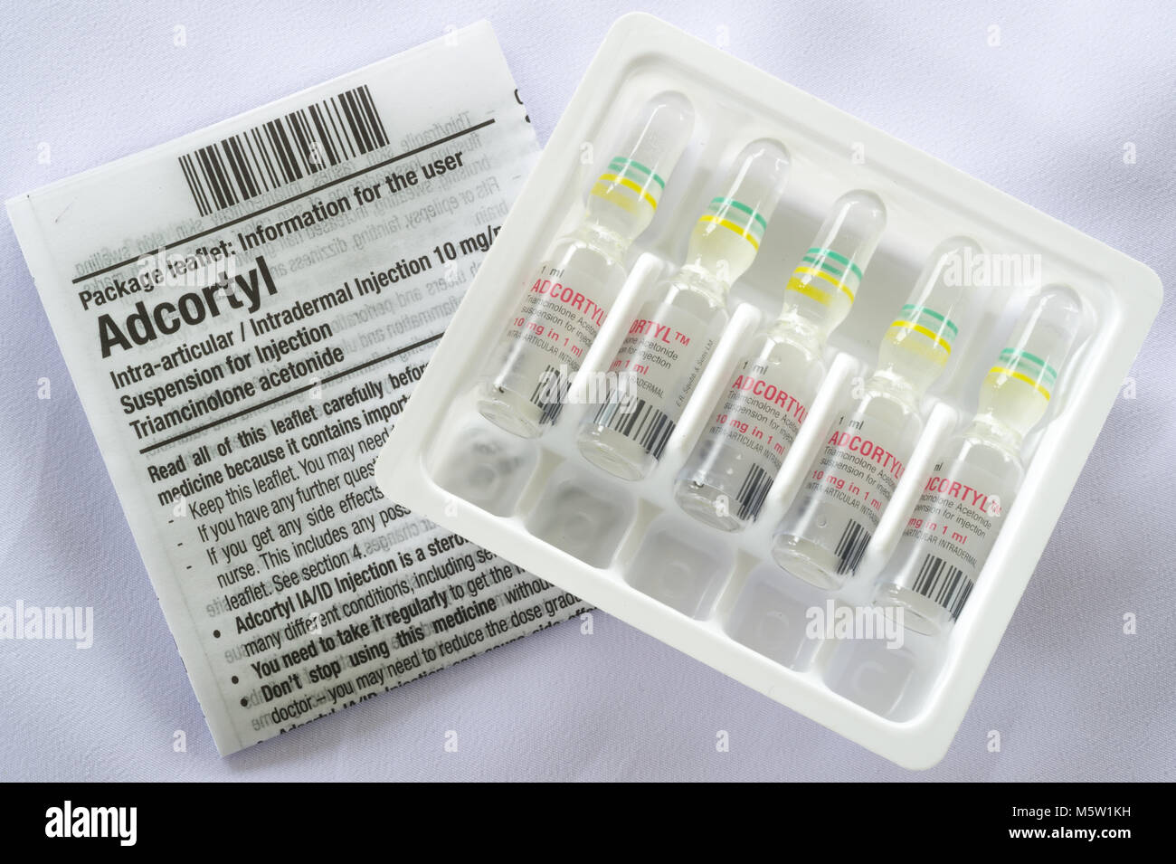 Adcortyl Intra-articular / Intradermal Injection isolated on a white background with information leaflet. THIS IS A PICTURE, NOT THE PRODUCT. Stock Photo