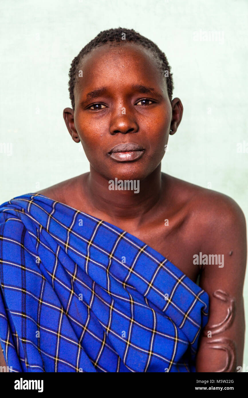 A Portrait Of A Young Woman From The Bodi Tribe, Bodi Village, Omo Valley, Ethiopia Stock Photo