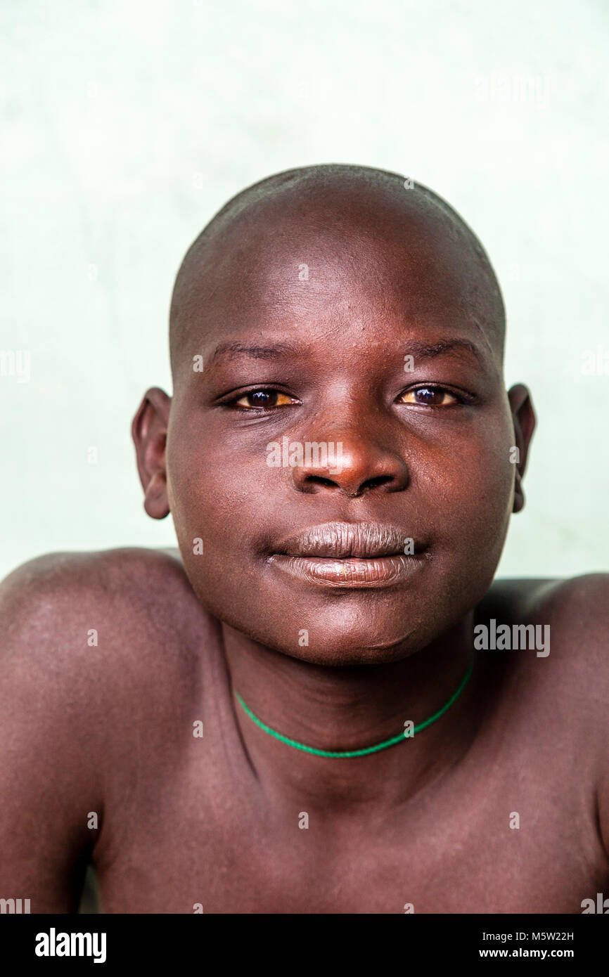 A Portrait Of A Young Man From The Bodi Tribe, Bodi Village, Omo Valley, Ethiopia Stock Photo
