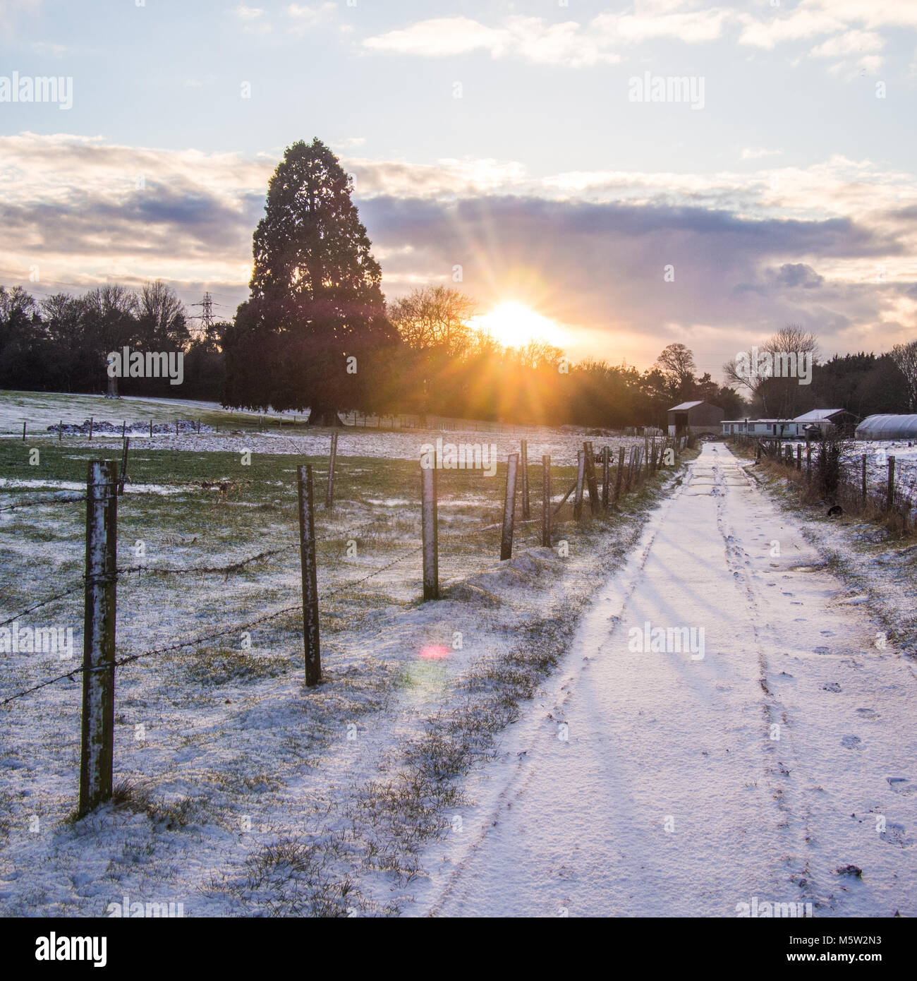 Rural snow scene in Hertfordshire England. Part of the Bhaktivedanta Manor Grounds. Stock Photo