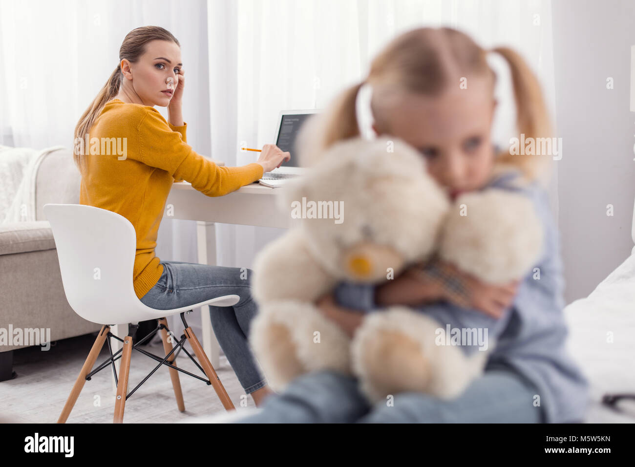 Worried single mom having problem with daughter Stock Photo