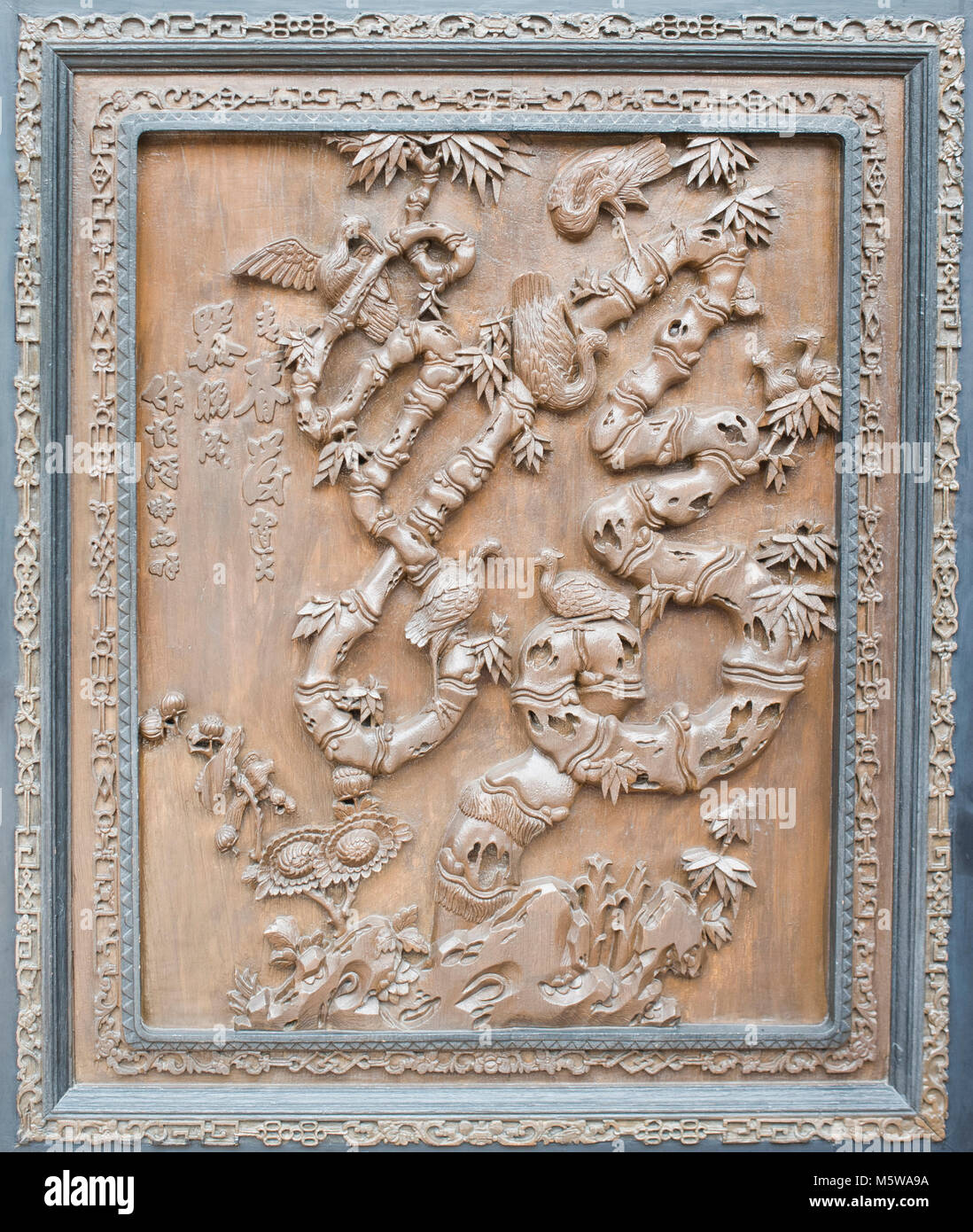ancient wood carving  Chinese characters 'fu', means blessing and good fortune. Stock Photo