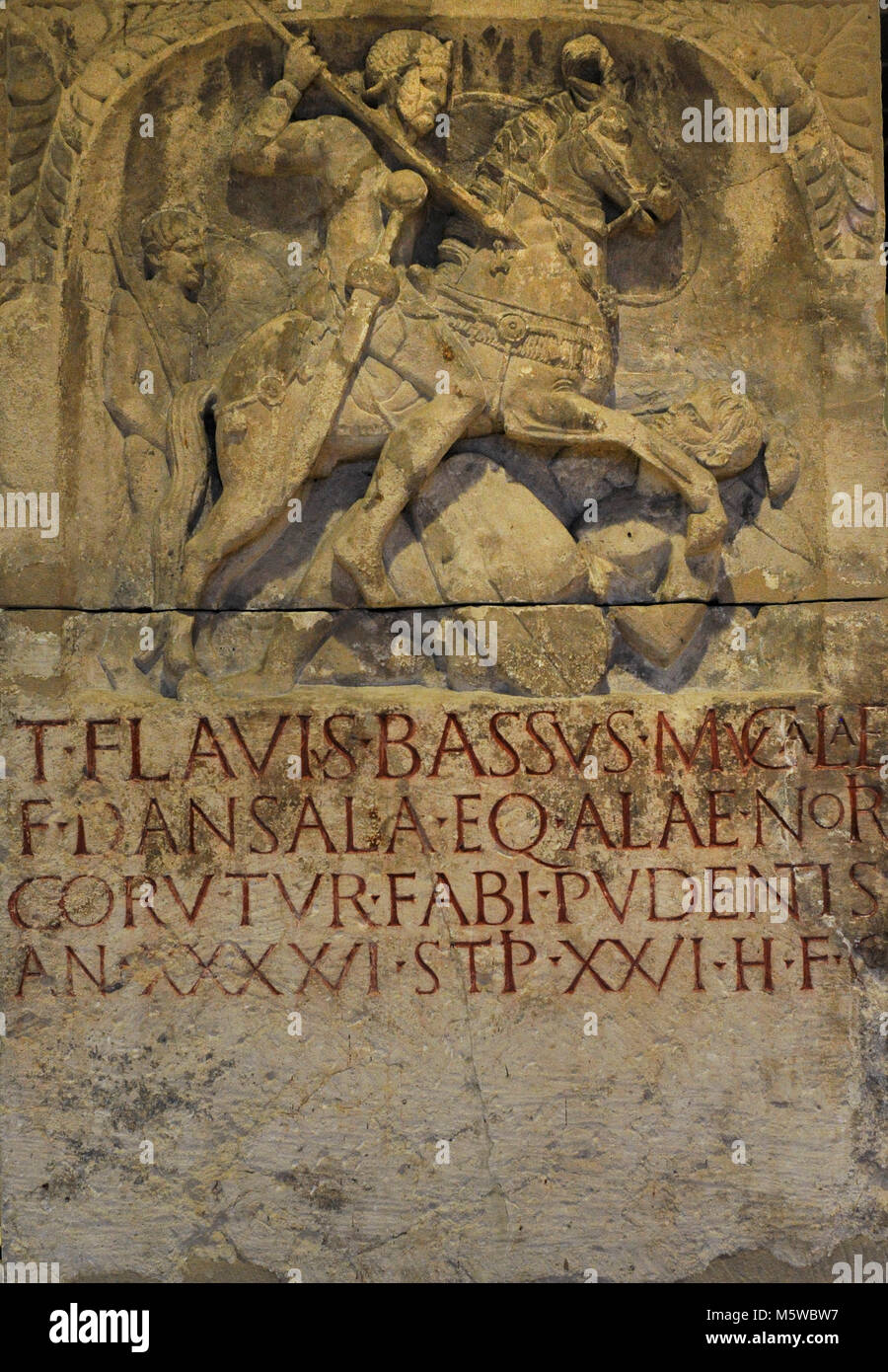 Roman funerary stele of the cavalryman Flavius Bassus depicted as a military hero. 1st century AD. Found in Cologne, Germany. Roman-Germanic Museum. Cologne. Germany. Stock Photo