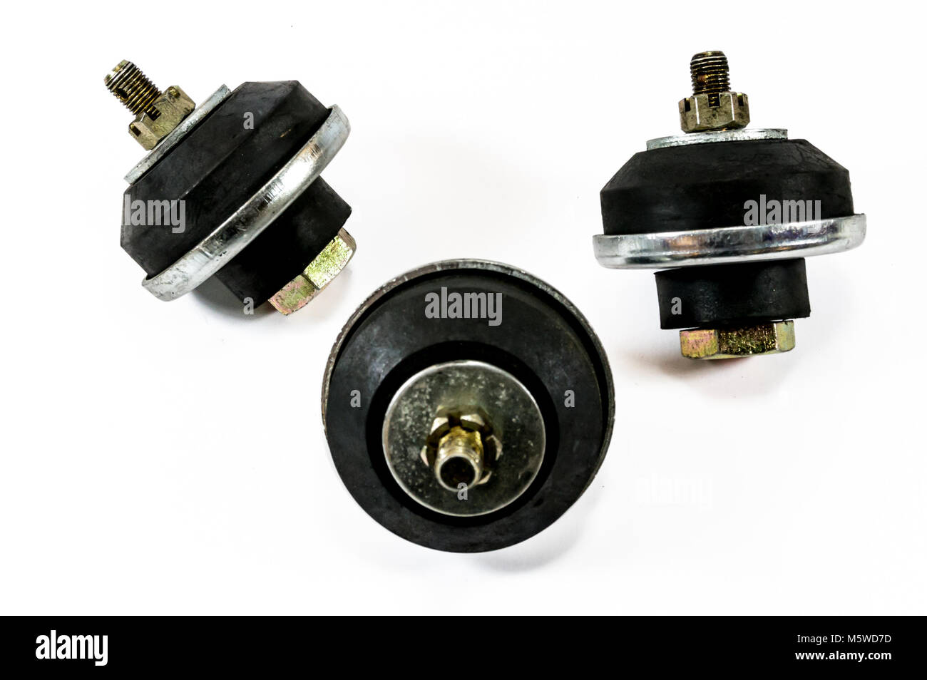 Antique vintage automotive rubber motor mounts and bolts Stock Photo