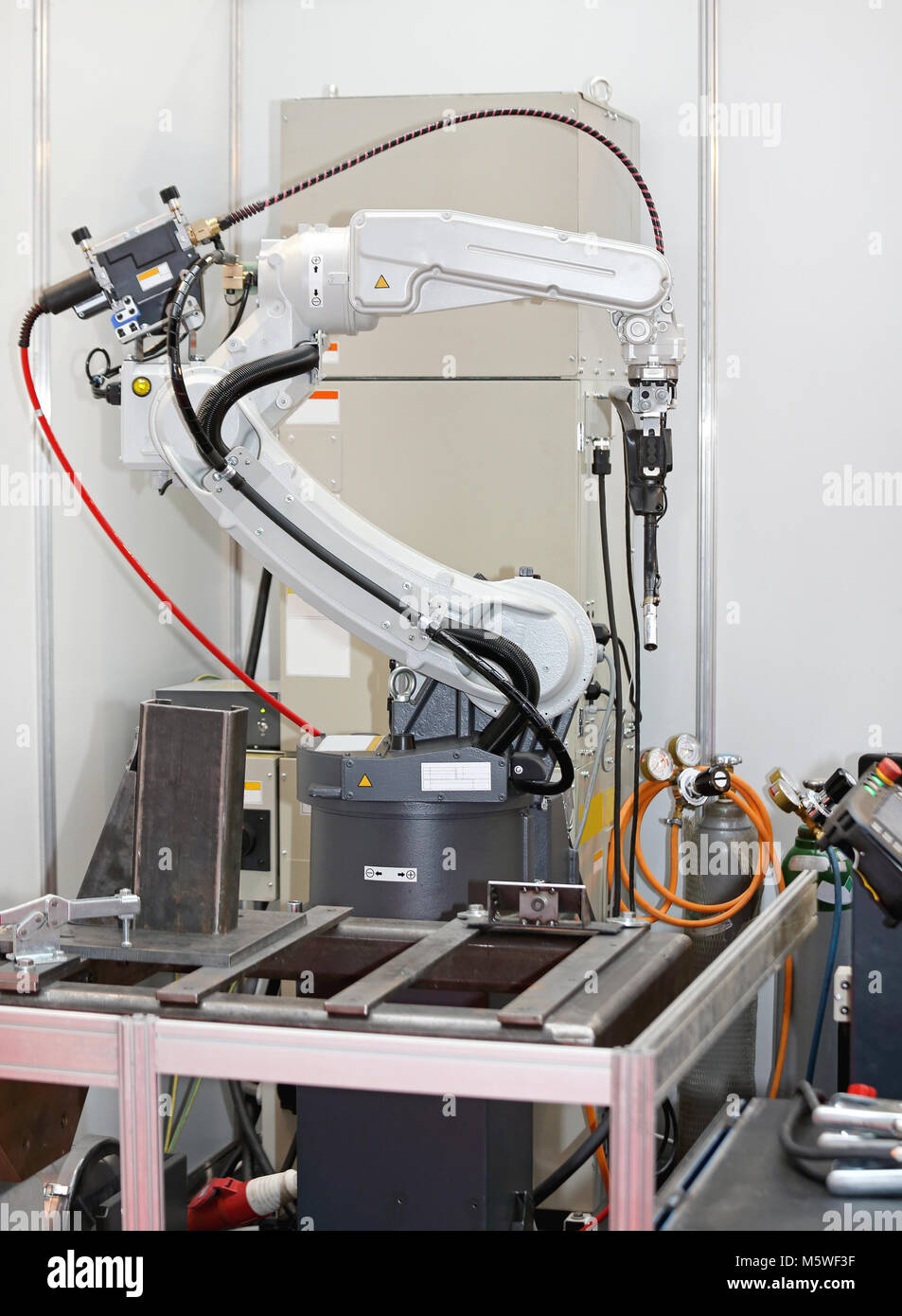 Robotic Arm Welding Parts in Factory Stock Photo Alamy