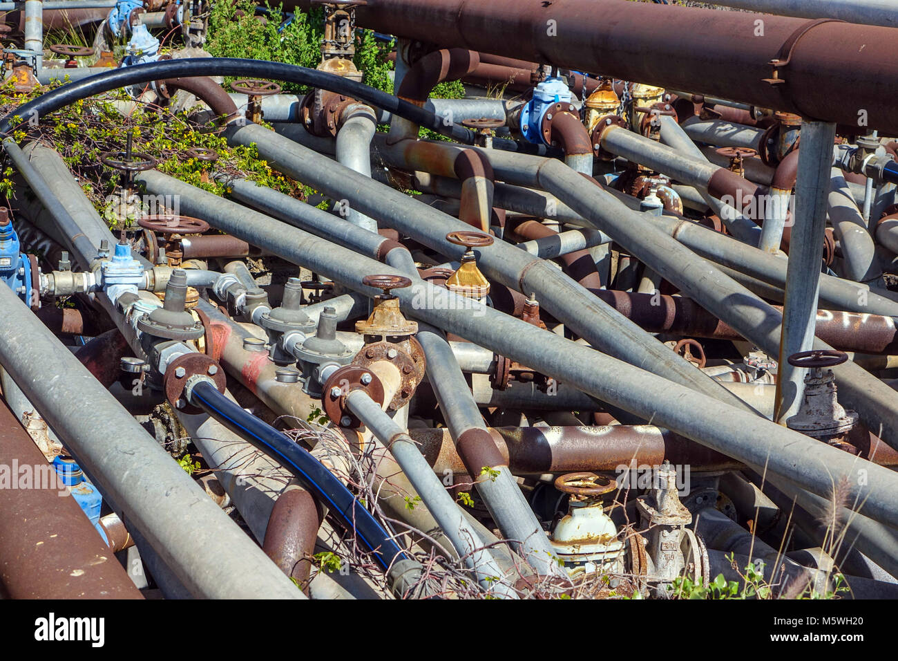 A confused mass of water pipes by the roadside, Guia de Isora ...