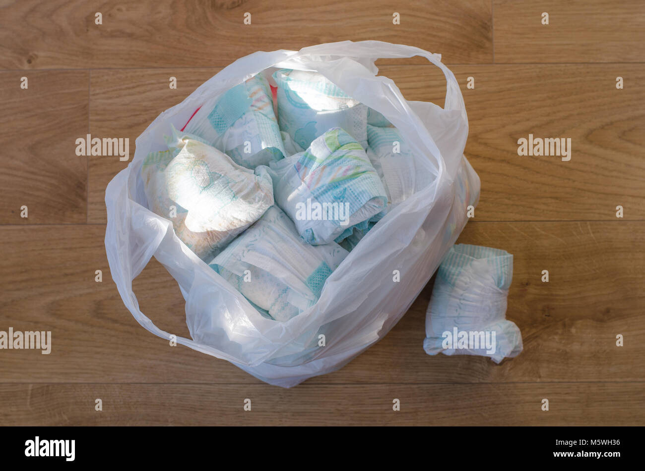 Trash bag with baby diapers hires stock photography and images Alamy