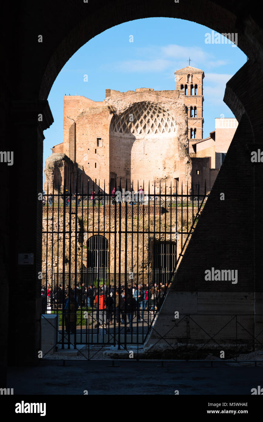Temple of Venus and Roma seen from the Coliseum, Roman Forum, the church tower in the background is Santa Francesca Romana. Rome, Lazio, Italy. Stock Photo