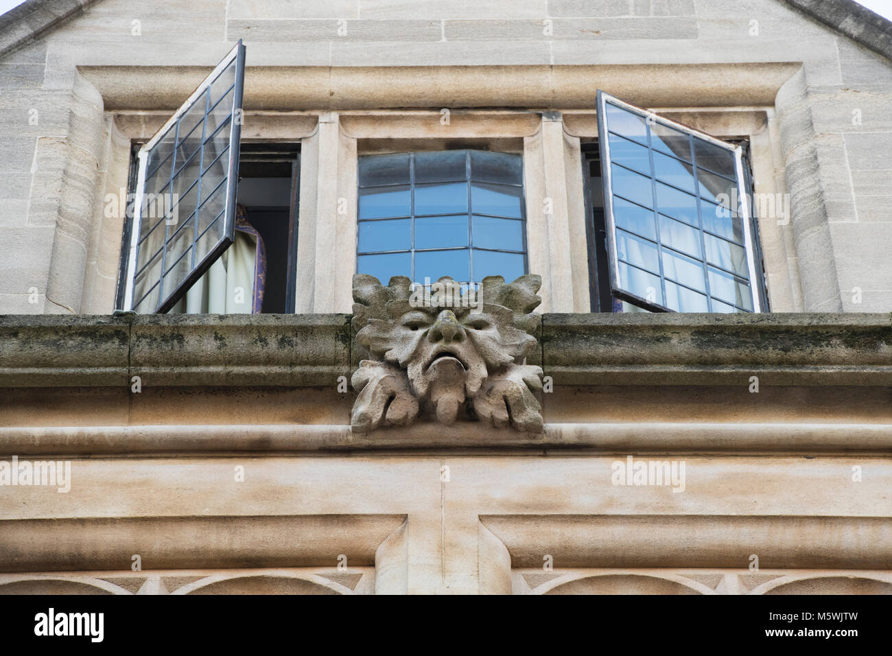 Carved stone gargoyles / grotesques on an oxford university building. Oxford, Oxfordshire, England Stock Photo