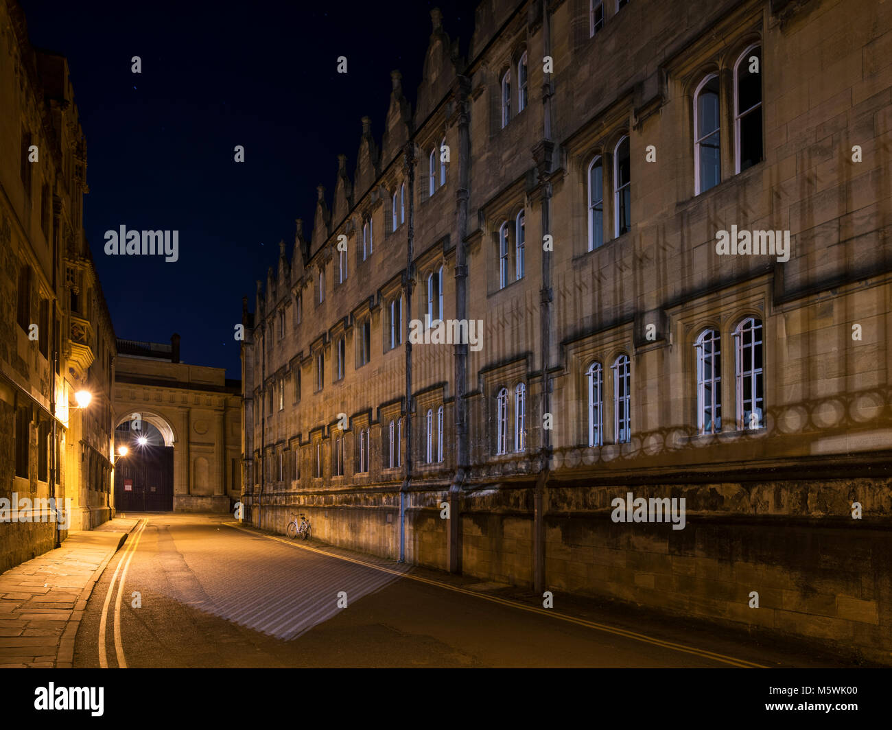 Oriel college exterior in Merton street at night. Oxford, Oxfordshire, England Stock Photo