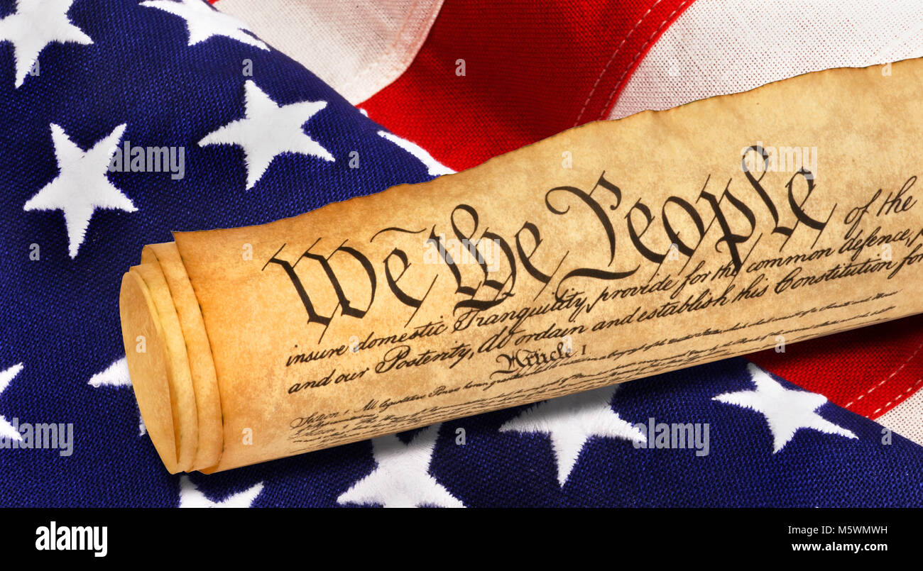 We the People with American flag. Stock Photo