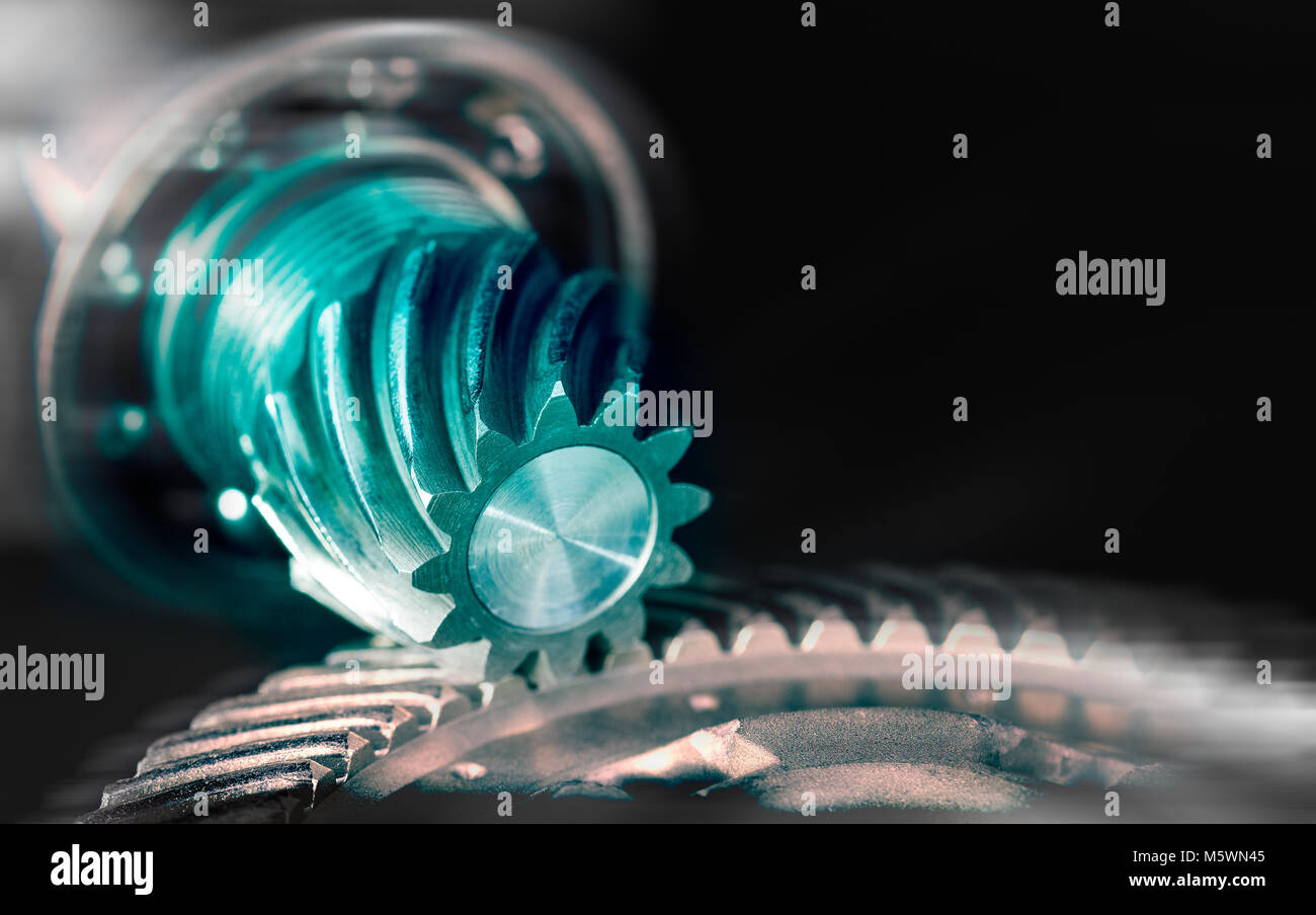 Abstract detail of steel gear mechanism in motion. Artistic background ...