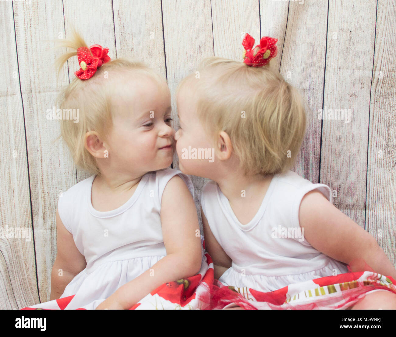 cute babies twins girls Stock Photo - Alamy