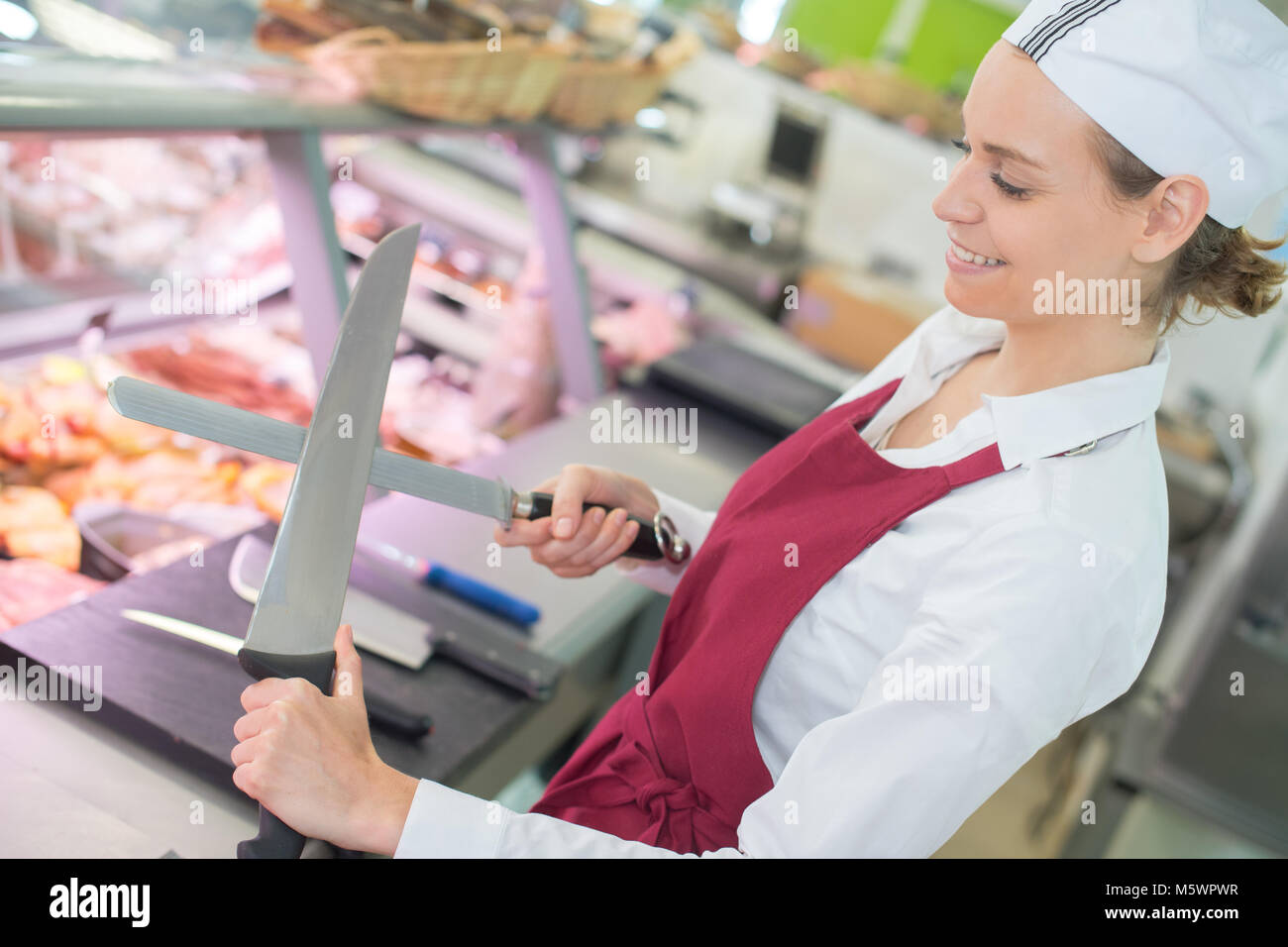 Supermarket deli worker hires stock photography and images Alamy
