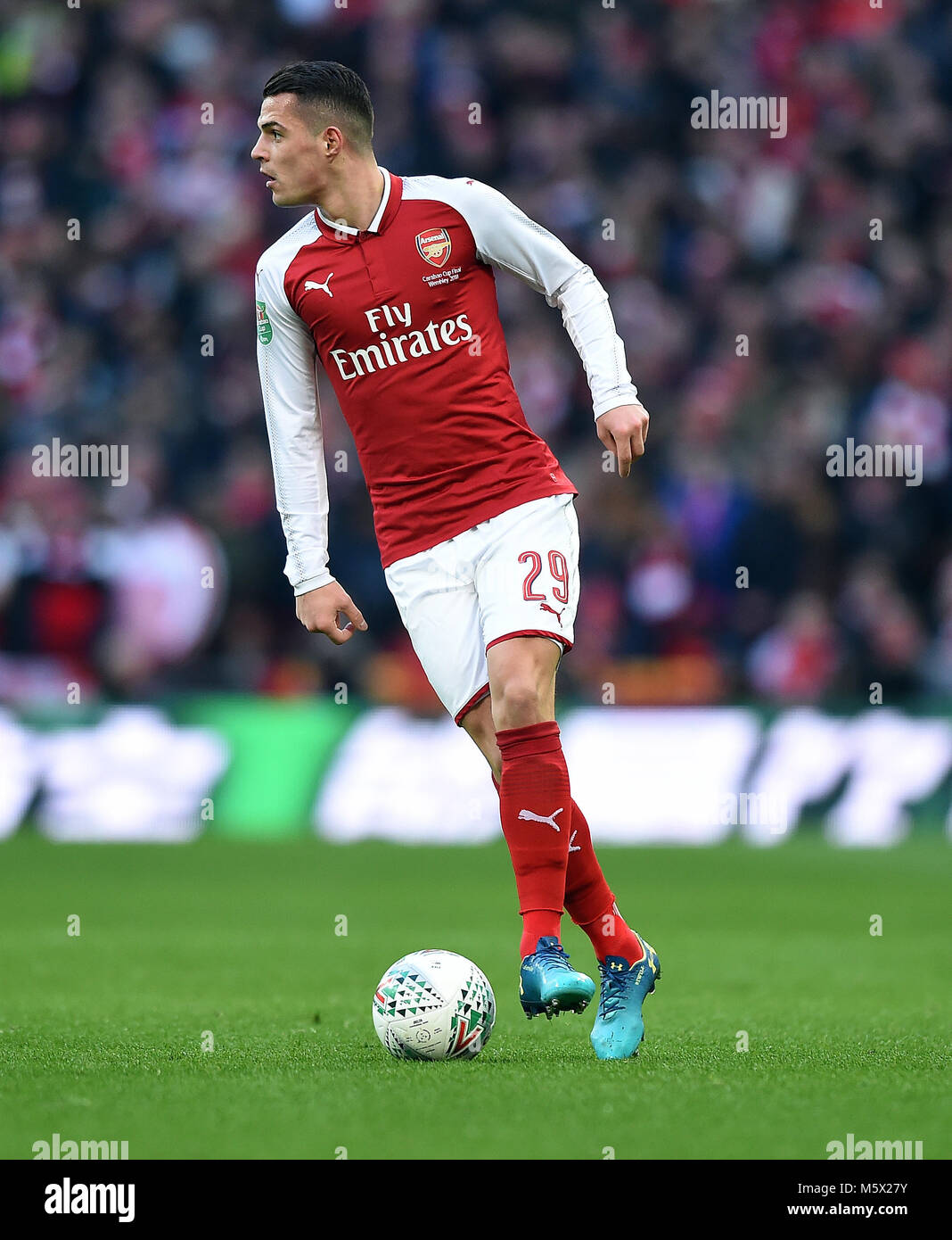 Granit Xhaka of Arsenal ARSENAL V MANCHESTER CITY ARSENAL V MANCHESTER CITY, EFL CUP FINAL 25 February 2018 GBB6805 EFL CUP FINAL 25/02/18 STRICTLY EDITORIAL USE ONLY. If The Player/Players Depicted In This Image Is/Are Playing For An English Club Or The England National Team. Then This Image May Only Be Used For Editorial Purposes. No Commercial Use. The Following Usages Are Also Restricted EVEN IF IN AN EDITORIAL CONTEXT: Use in conjuction with, or part of, any unauthorized audio, video, data, fixture lists, club/league logos, Betting, Games or any 'live' services. Also R Stock Photo