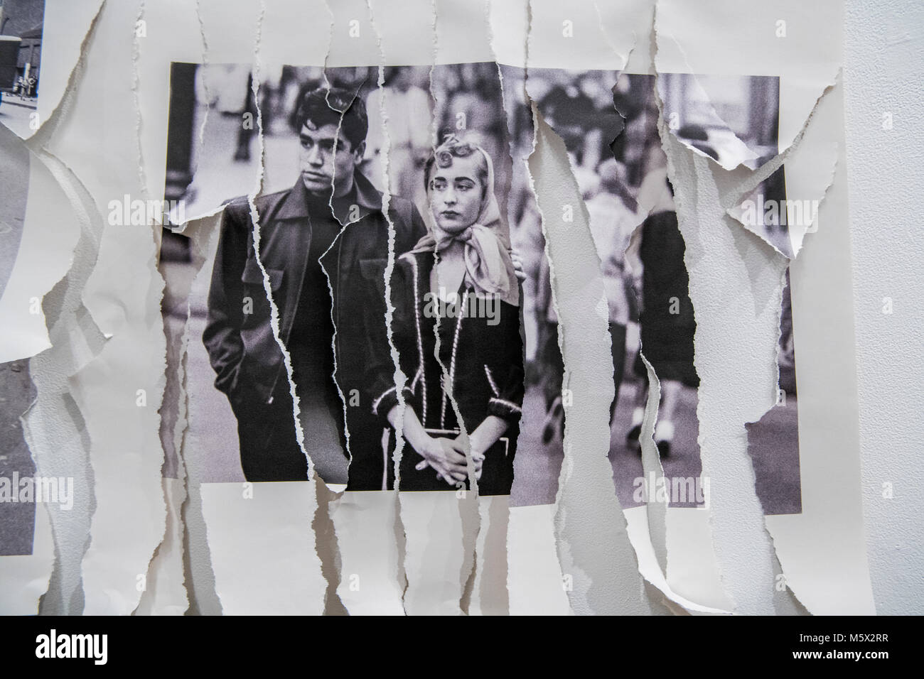 Portland, Oregon, USA. 26 FEB, 2018. The photographer Robert Frank's work from his groundbreaking book 'The Americans' hangs  defaced at Blue Sky Gallery in Portland, Oregon, USA. The work was destroyed in a “Destruction Dance” performance defacing the photographs with ink and mutilation with scissors, knives and even ice skates  at the end of it’s run. The destruction was Frank's protest regarding today's greed in the global art market. Credit: Ken Hawkins/Alamy Live News Stock Photo