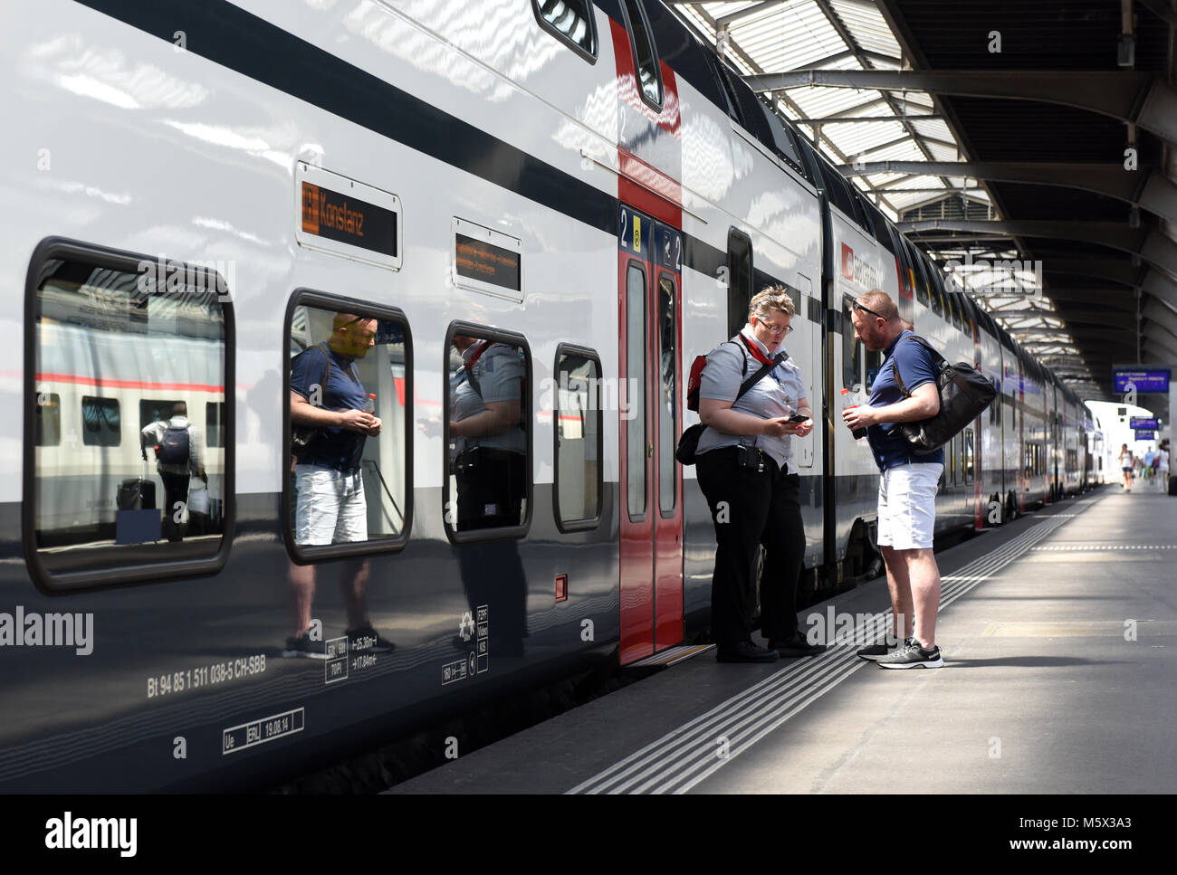 Zurich, Switzerland -  June 03, 2017: People near the train on Zurich main railway station. Zurich central train station (Zurich Hauptbahnhof). Stock Photo
