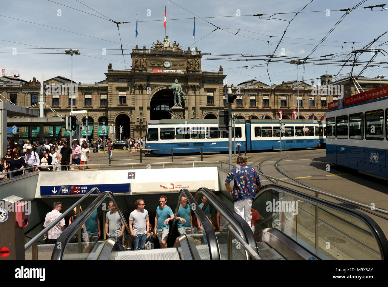 Zurich, Switzerland -  June 03, 2017:People near facade of the Zurich Main train station building (Zurich Hauptbahnhof or Zurich HB) is the largest train station in Switzerland. Stock Photo