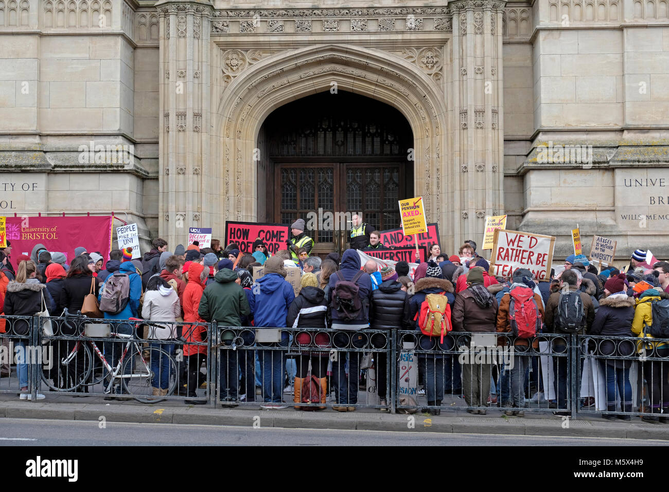 Bristol, UK. 26th February, 2018. Striking university staff picket outside the University of Bristol’s Wills Memorial Building while the university’s senate meets inside. The University and College Union (UCU) has called its members out on strike in protest at proposed changes to their pension scheme. Keith Ramsey/Alamy Live News Stock Photo