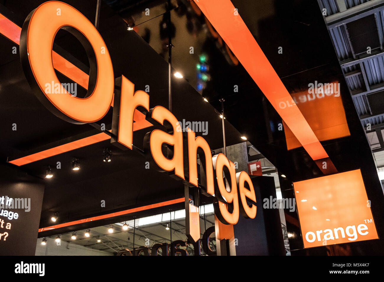 Barcelona, Catalonia, Spain. 26th Feb, 2018. Orange logo seen at the exhibition. The Mobile World Congress held in Barcelona, Spain, since 2006 and will be held until the year 2023. It is an annual conference around the world of mobile communication. Congress exhibited technologies such as Virtual reality, augmented reality, artificial intelligence, robotics, Drones, Hardware, Software and Robocar Credit: P Freire 26022018- DSF2191.jpg/SOPA Images/ZUMA Wire/Alamy Live News Stock Photo