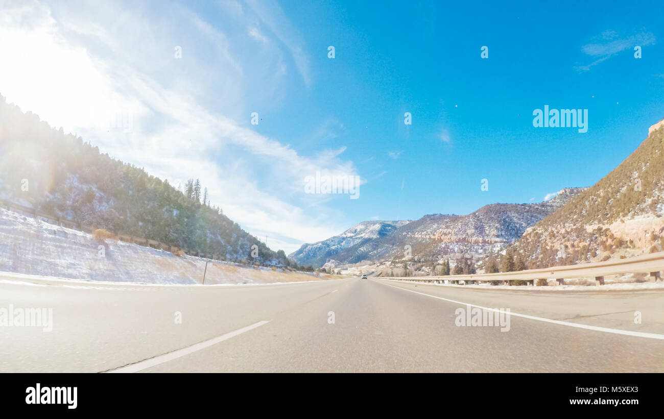 Driving through Mountain terrain in the Winter Stock Photo - Alamy