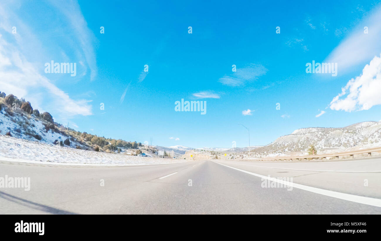 Driving through Mountain terrain in the Winter Stock Photo - Alamy
