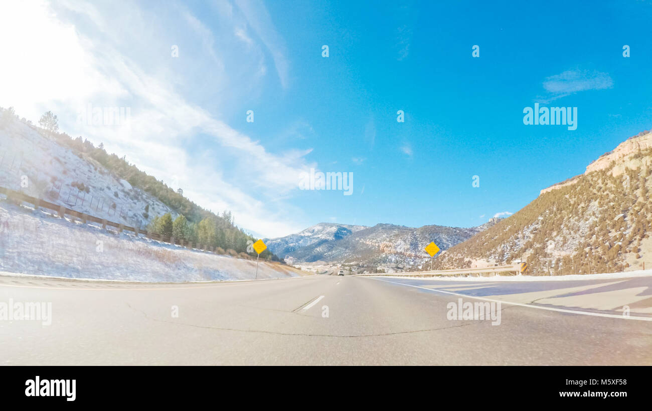 Driving through Mountain terrain in the Winter Stock Photo - Alamy
