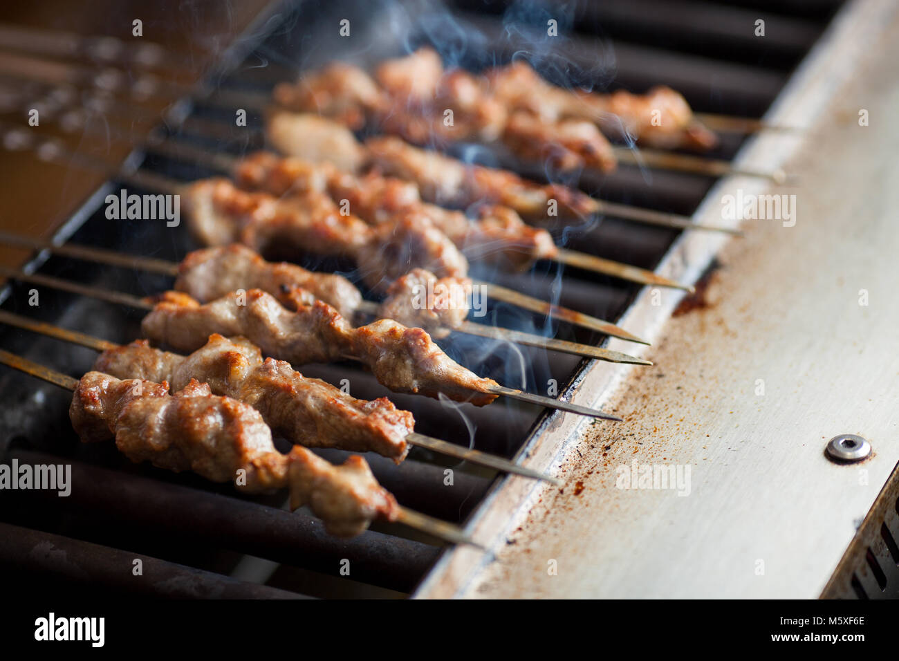 Chinese roasted lamb kebabs, Xinjiang cuisine Stock Photo Alamy