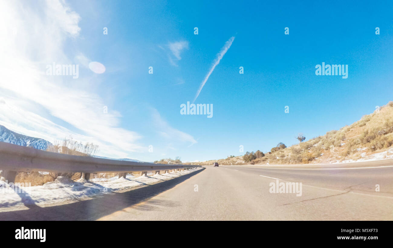 Driving through Mountain terrain in the Winter Stock Photo - Alamy
