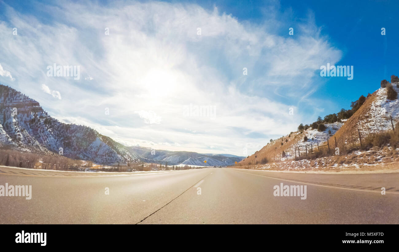 Driving through Mountain terrain in the Winter Stock Photo - Alamy