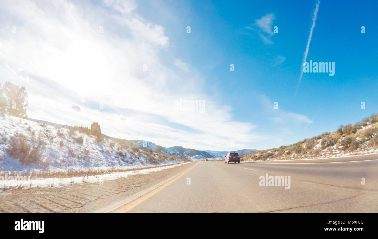 Driving through Mountain terrain in the Winter Stock Photo - Alamy