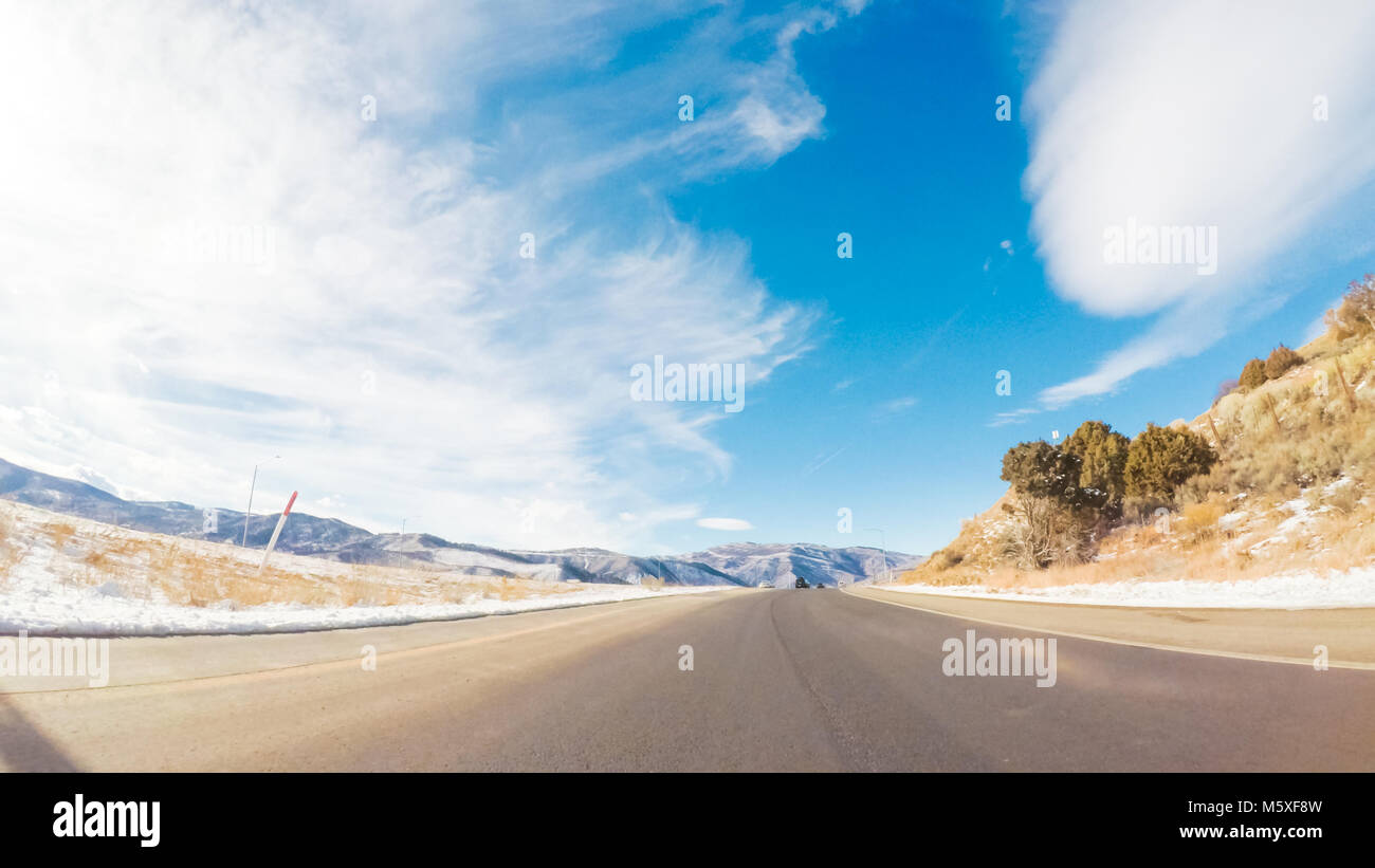 Driving through Mountain terrain in the Winter Stock Photo - Alamy