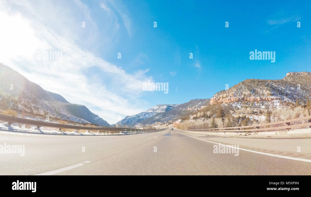 Driving through Mountain terrain in the Winter Stock Photo - Alamy
