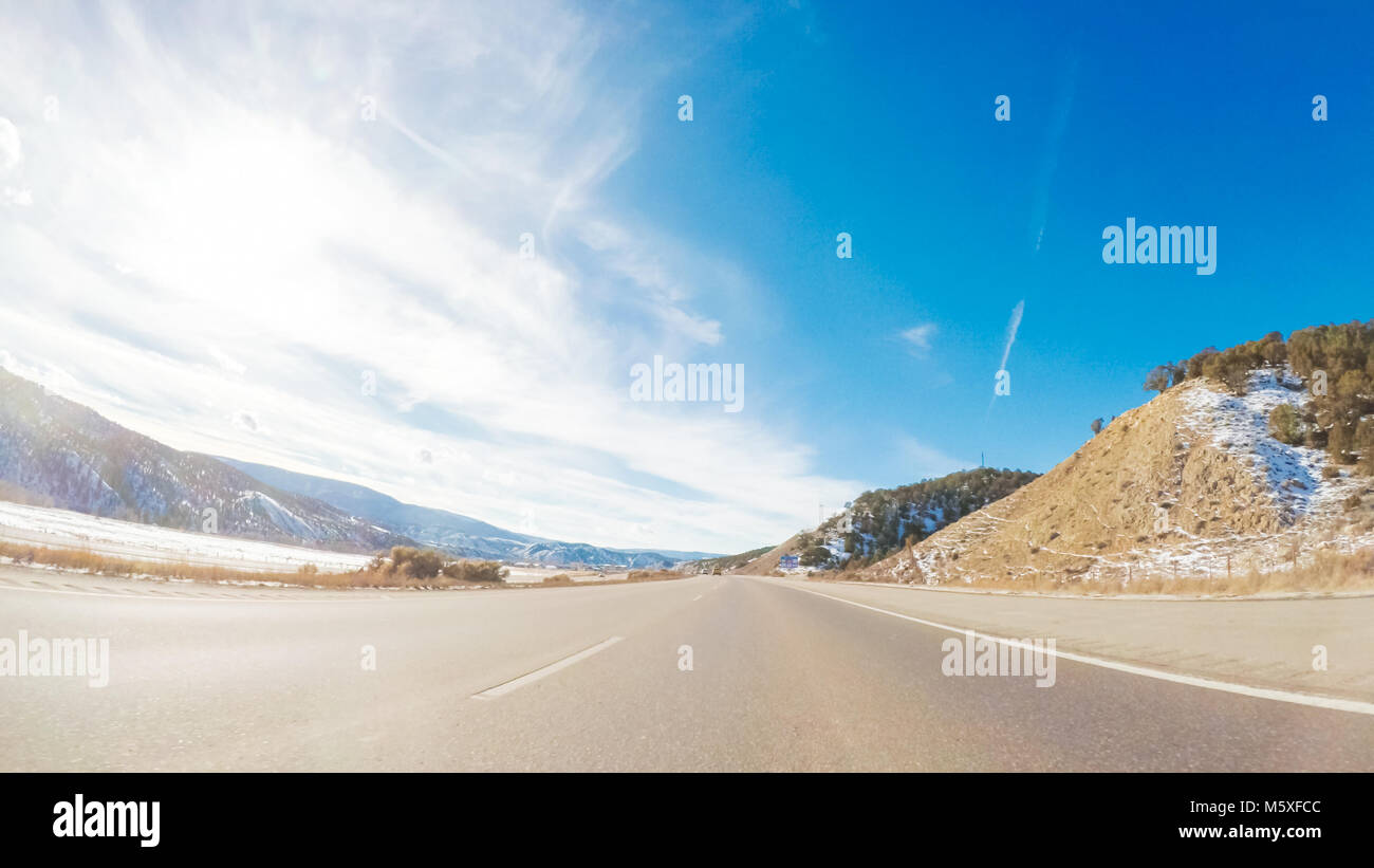 Driving through Mountain terrain in the Winter Stock Photo - Alamy