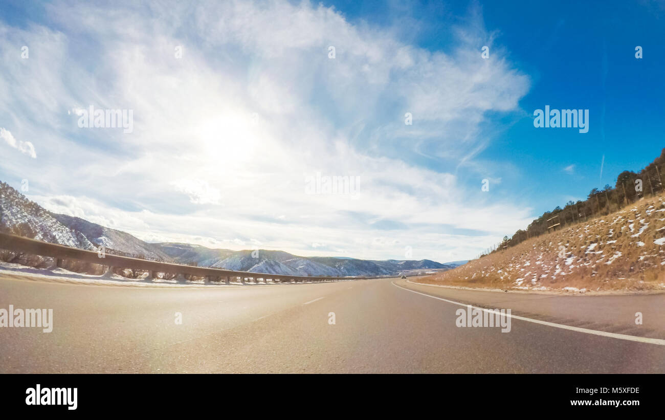 Driving through Mountain terrain in the Winter Stock Photo - Alamy