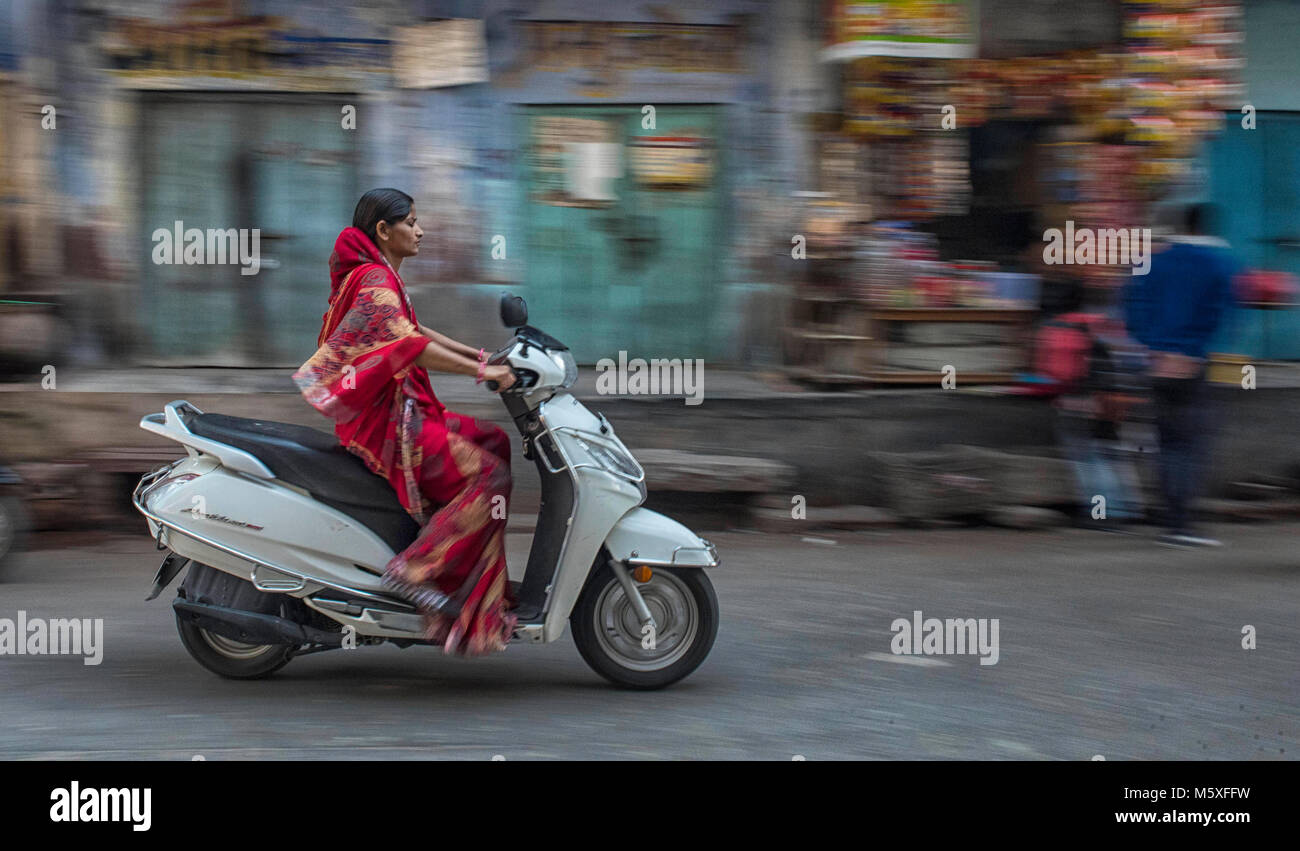 India lady riding scooter hires stock photography and images Alamy